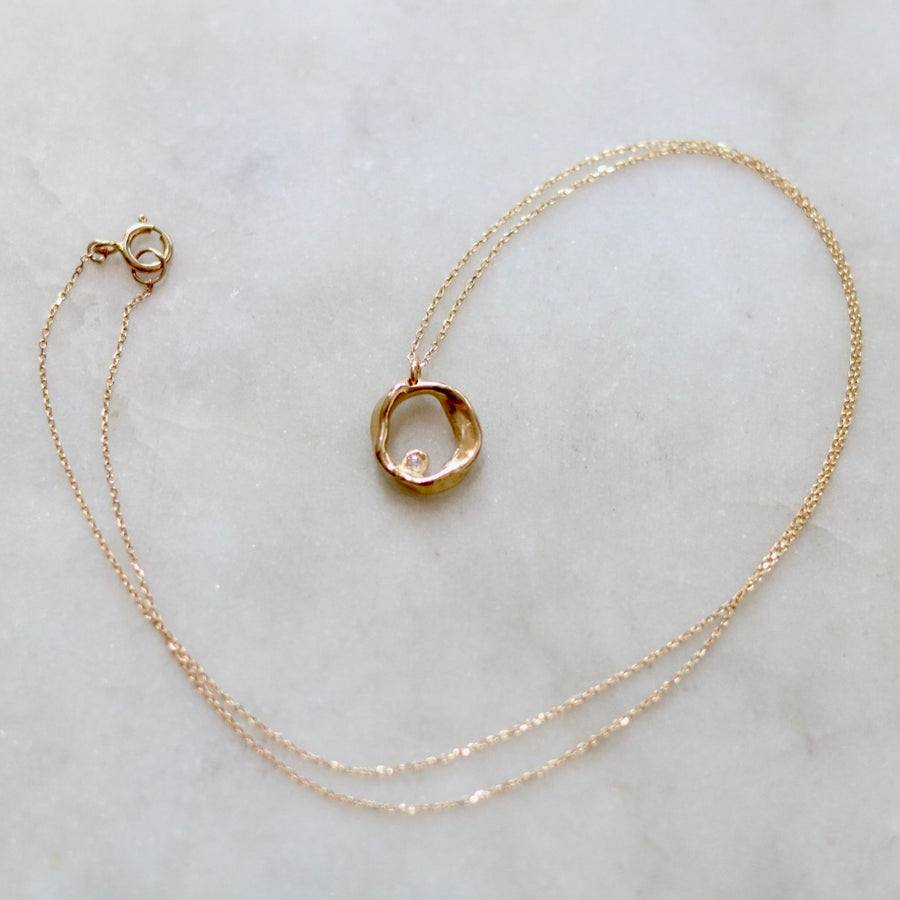 Gold and Diamond Ripple Circle Necklace