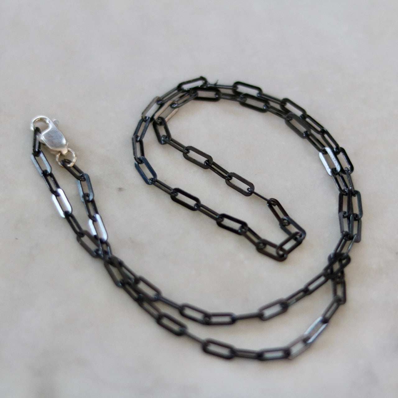 24 inch Black Rhodium Coated Silver Chain – Written by Forest